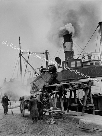 SHIP UNLOADING GRAIN ON COUNTRY ROAD